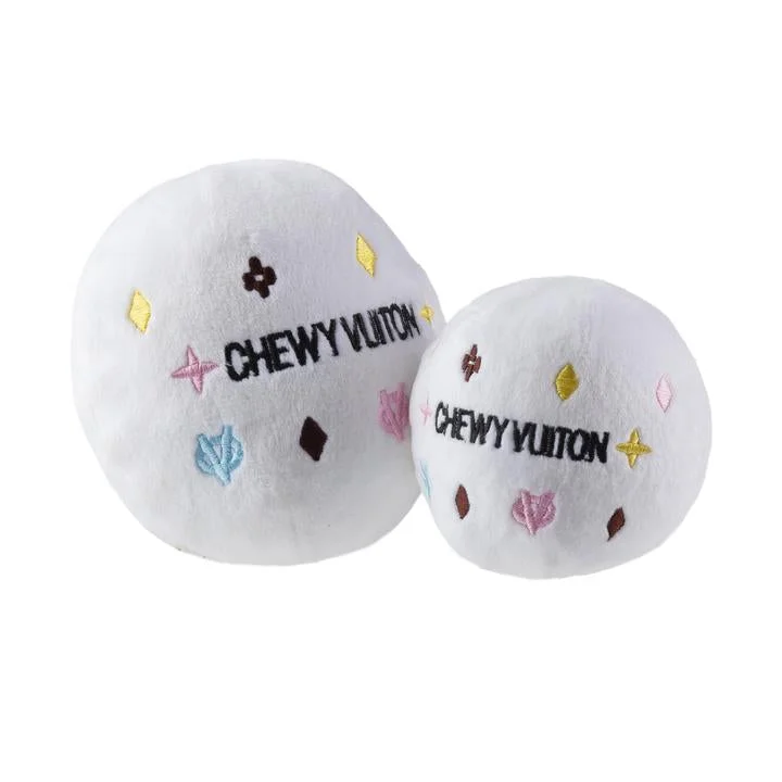 - Parrot toy selectionWhite Chewy Vuiton Ball Dog Toy